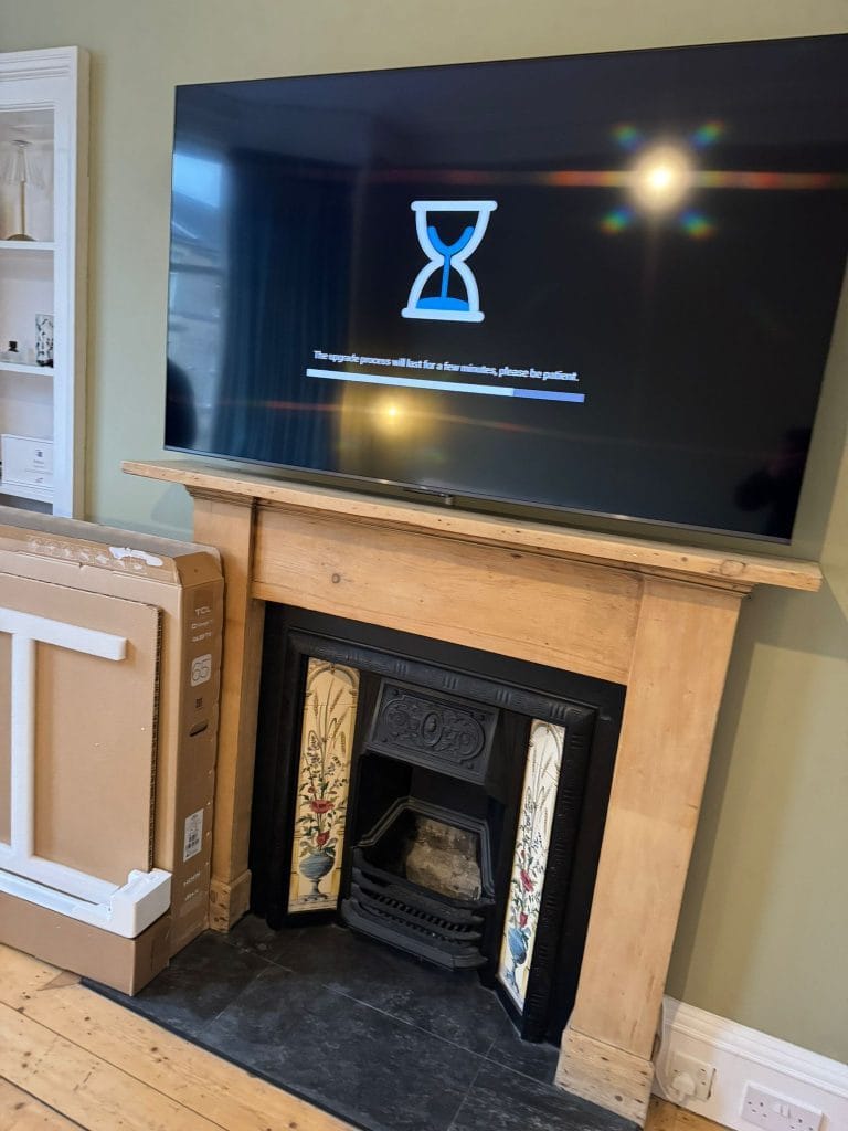 New TV installed above a period fireplace